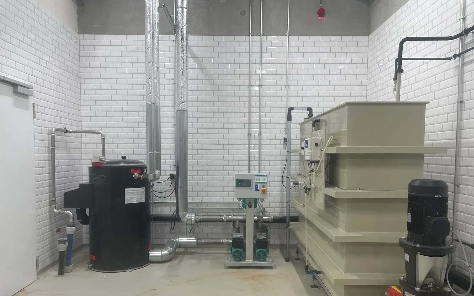Plant room with tanks, pumps and dosing